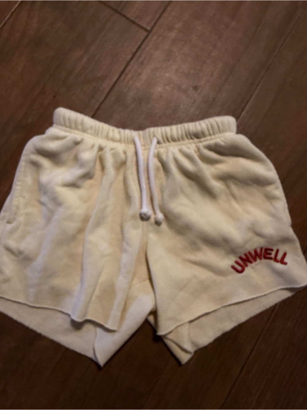 Unwell Cream Drawstring Sweat Shorts with Red Logo